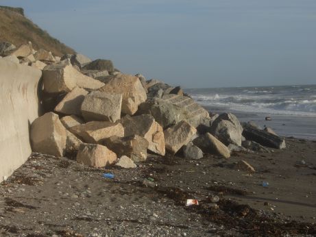 Photograph of rip/rap and a coastal wall