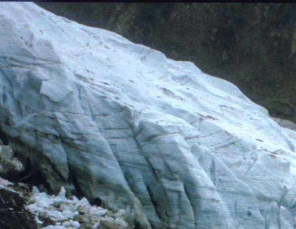 [ glacier snout, showing foliation from shear, 
geography-site.co.uk ]